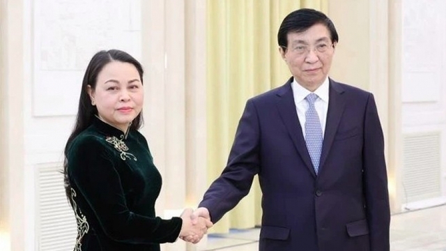 Vietnam, China boost front work cooperation