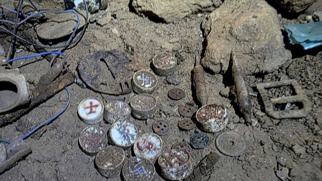 Martyrs’ remains found in cave with Chinese chess set, wartime artefacts