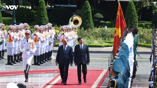 Chủ tịch nước và Phu nhân chủ trì Lễ đón chính thức Tổng Bí thư, Chủ tịch nước Lào