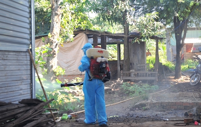 Local medical workers disinfects the homes of the child and nearby households