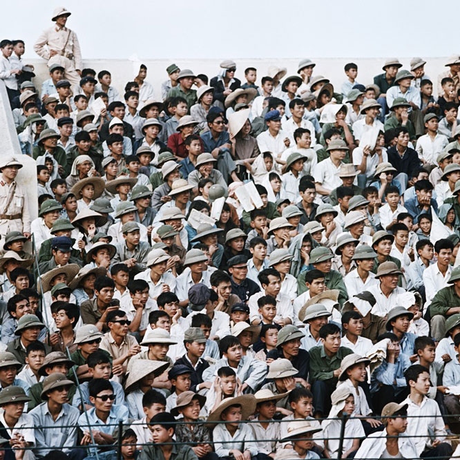 The Hang Day stadium in 1975 is packed with cheering football fans.