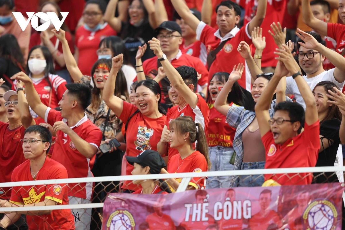 Supporters cheer on their teams with enthusiasm.