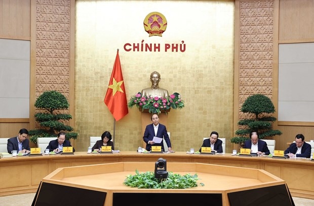 Prime Minister Nguyen Xuan Phuc (standing) addresses the meeting of the Central Emulation and Rewards Council on November 30 (Photo: VNA)