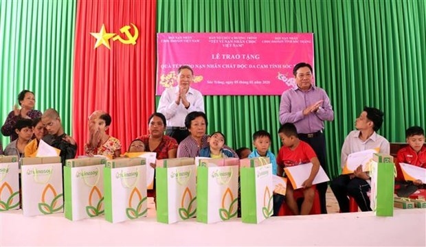 Presenting gifts to Agent Orange/dioxin victims