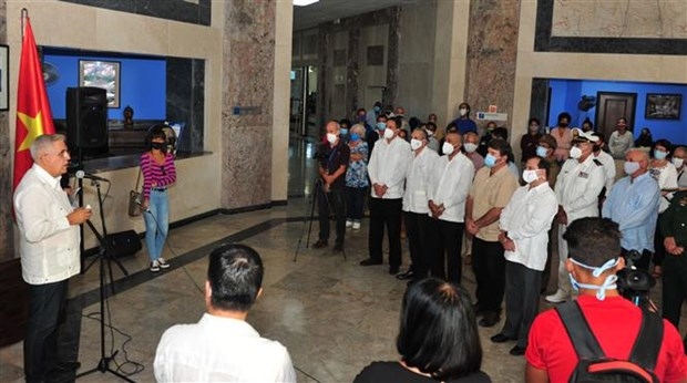 Visitors attend the opening ceremony of the exhibition in Havana, Cuba, on Dec. 2.
