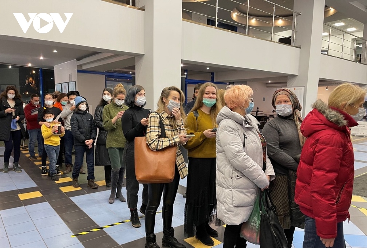 Russian audiences line up as they enter the cinema. Each member of the audience must wear a face mask and follow novel coronavirus (COVID-19) prevention and control measures while participating in the event.