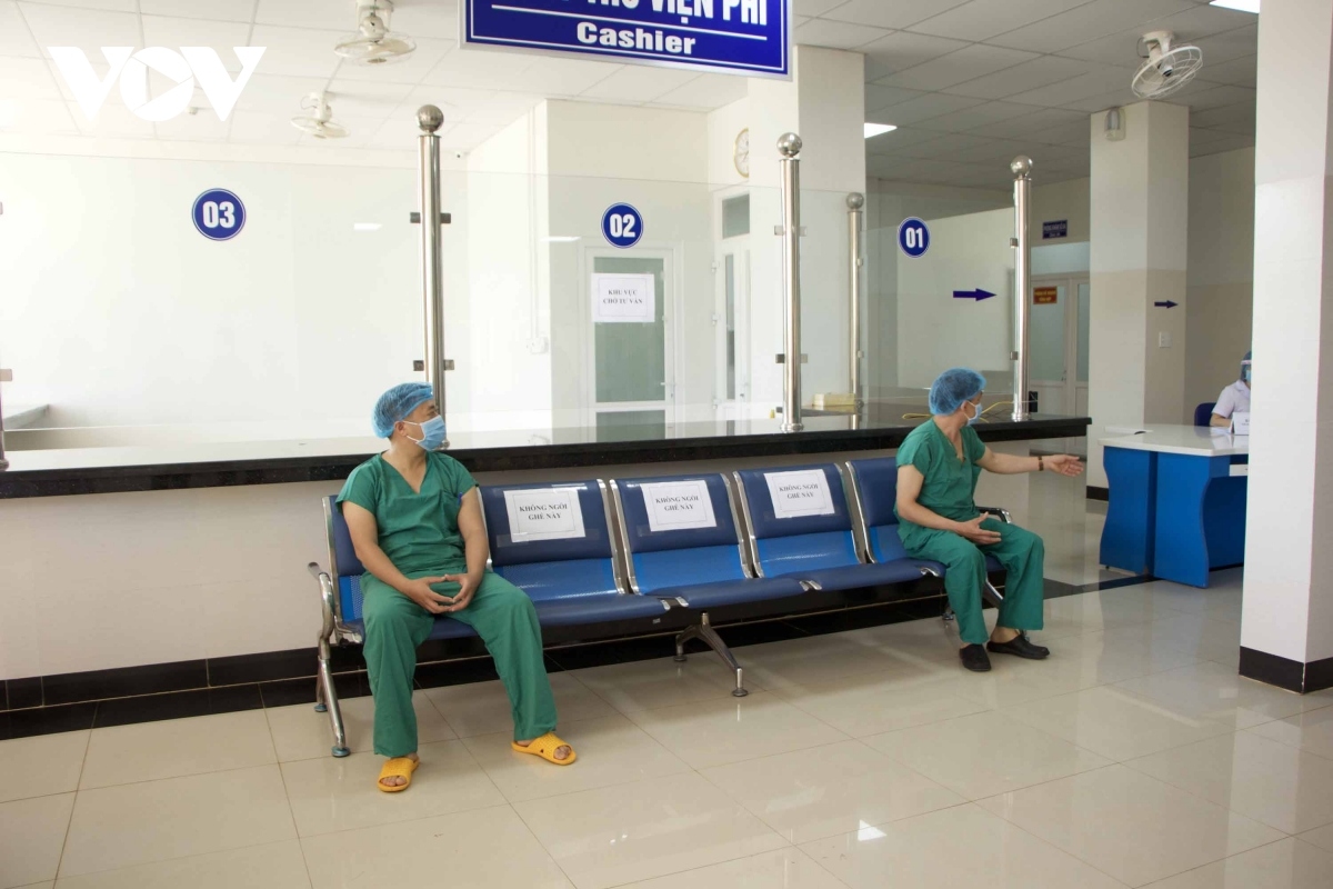 After receiving their inoculation, the workers are closely monitored for a period of 30 minutes in order to ensure safety.