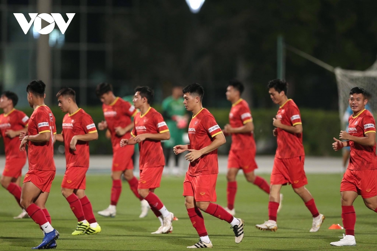 Each of the footballers take part in some light exercise as they warm-up.