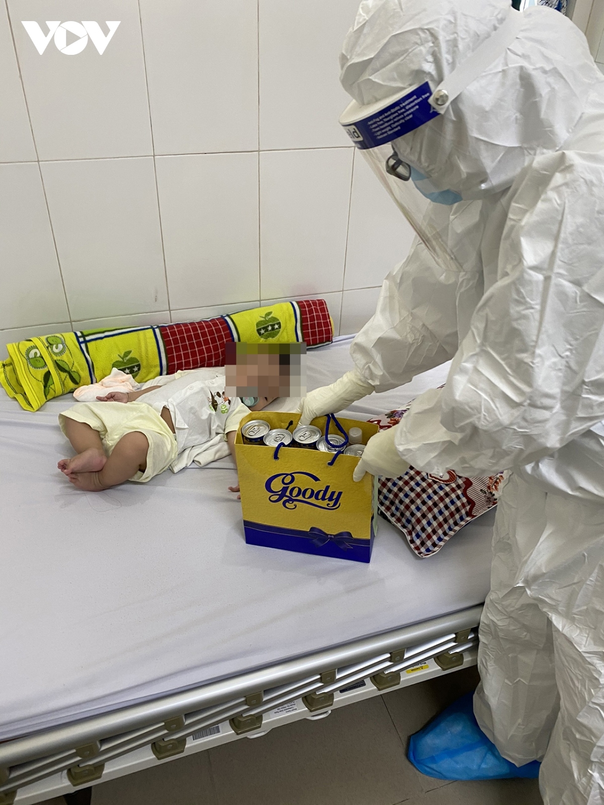 A doctor prepares a special gift for a six-month-old baby in the Da Nang Lung Hospital.