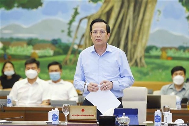 Minister of Labour, Invalids and Social Affairs Dao Ngoc Dung speaks at the meeting (Photo: VNA)