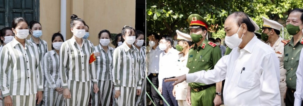 President Phuc inquires into prison inmates' living conditions at the camp.