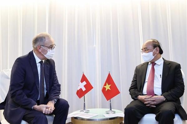 President Nguyen Xuan Phuc (R) meets Swiss President Guy Parmelin (Photo: VNA)