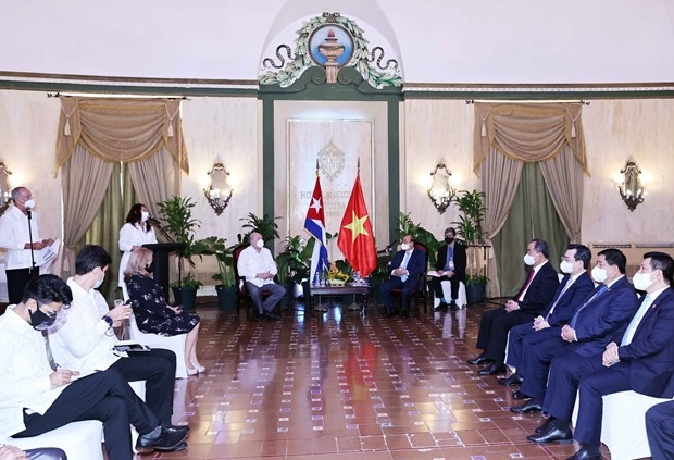 The meeting between President Nguyen Xuan Phuc and Cuban Minister of Foreign Trade and Investment Rodrigo Malmierca Diaz and leaders of the Mariel Special Development Zone. (Photo: VNA)