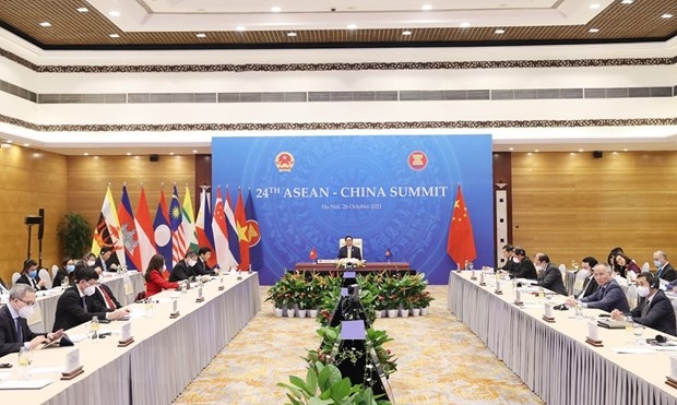 PM Pham Minh Chinh attends 24th ASEAN-China Summit virtually held by Brunei from Hanoi. (Photo: VNA)