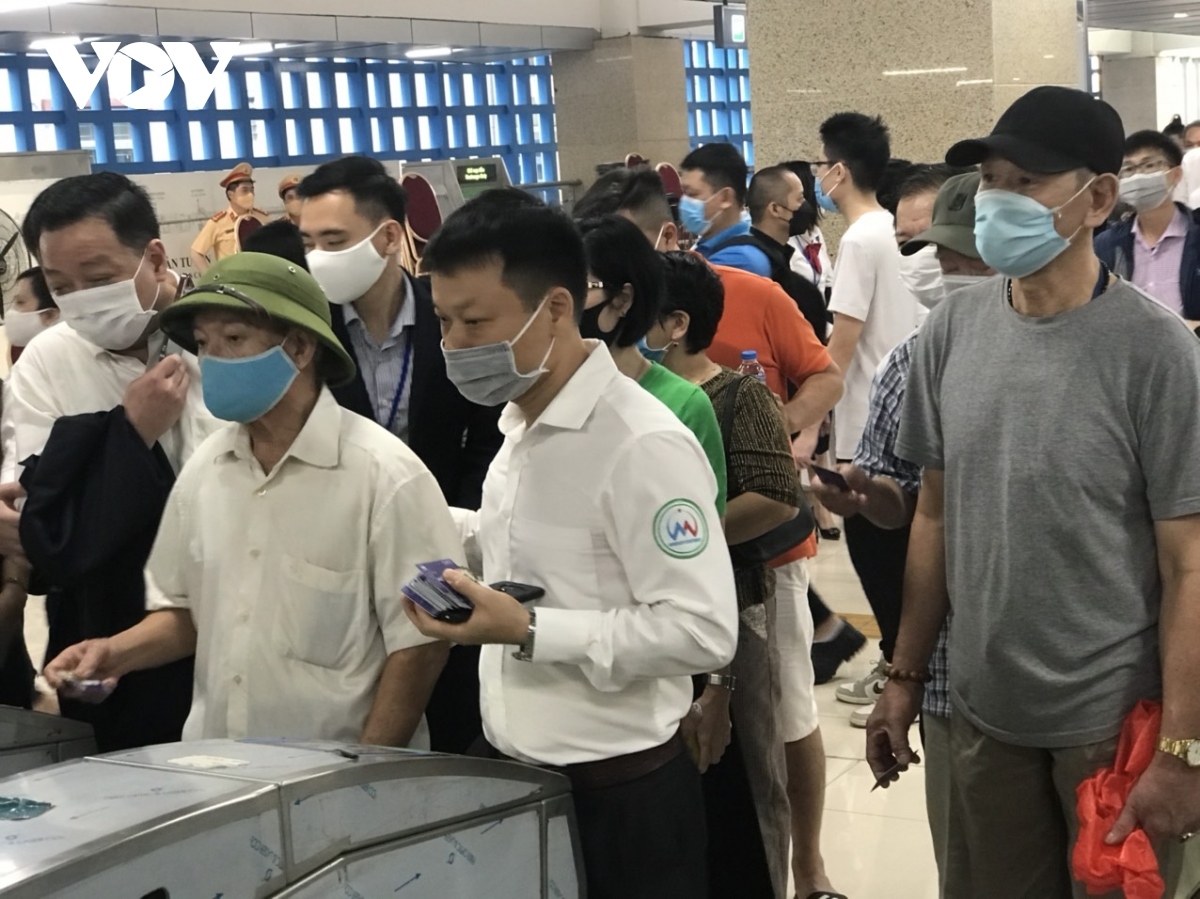 The station is packed with hordes of local people lining up