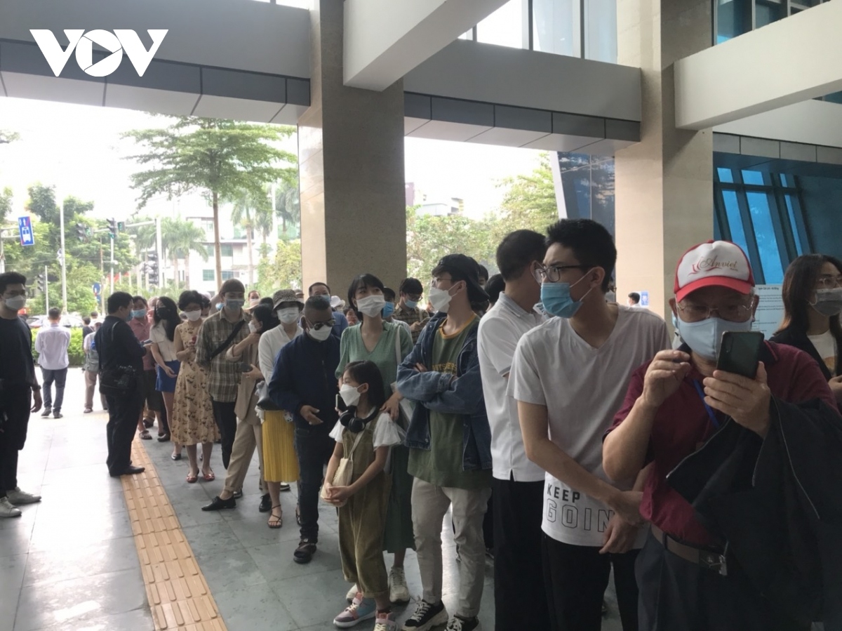 On its first day of operation, the main station is crowded as people are curious to travel on a new mode of transport.