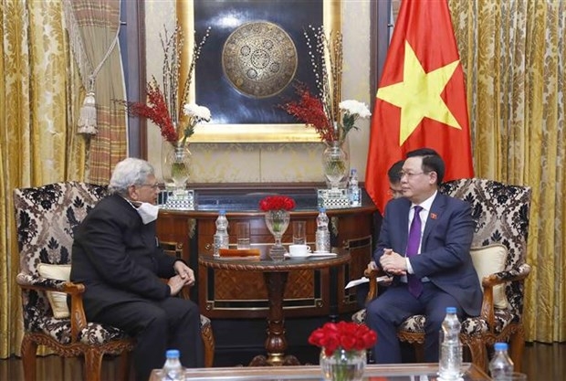 NA Chairman Hue (R) receives General Secretary of the Communist Party of India (Marxist) (CPI-M) Sitaram Yechury (Photo: VNA)