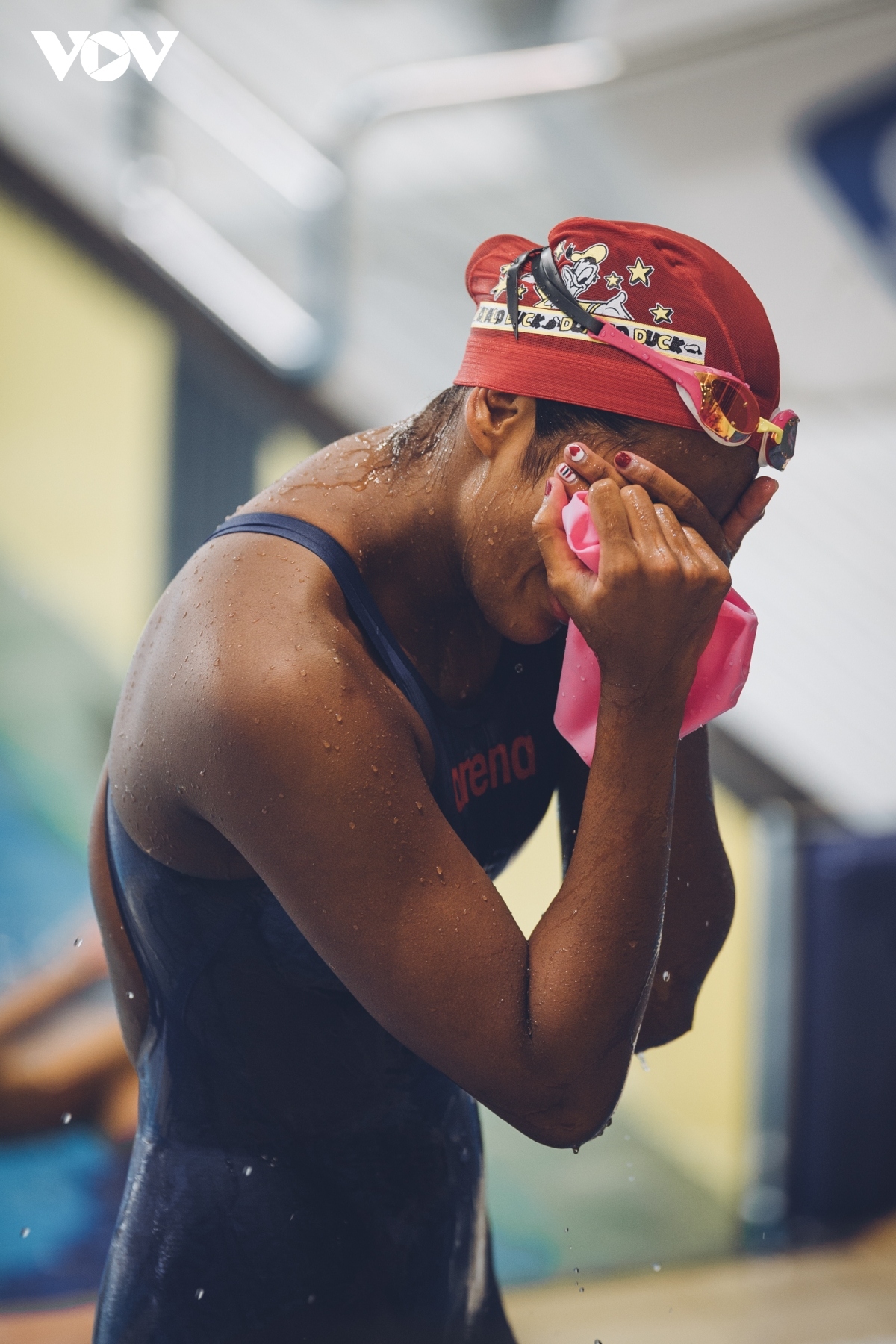 An athlete can’t hide her emotions as she bursts into tears after pocketing a gold medal.