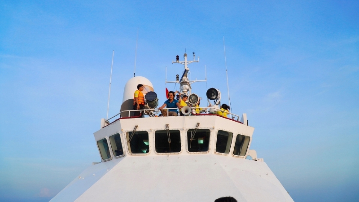 Vietnam Television (VTV) journalists make a report on the Vietnamese Coast Guard vessel.