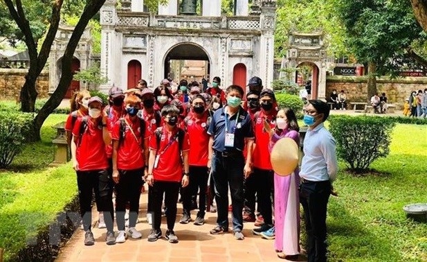 A group of foreign tourists to the Temple of Literature in Hanoi