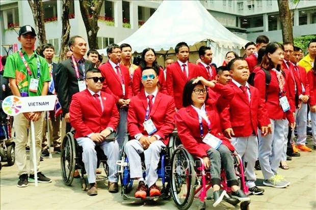 Vietnamese athletes attend the flag hoisting ceremony of the 9th ASEAN Para Games in Malaysia in 2017.