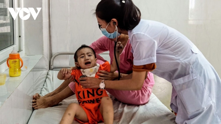 A boy with HFM disease receives treatment at a hospital in Hanoi