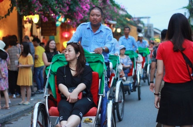 Korean tourists visit Hoi An Ancient Town