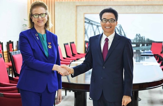 Deputy Prime Minister Vu Duc Dam welcomesCaitlin Wiesen, outgoing resident representative of the UN’s Development Programme (UNDP)