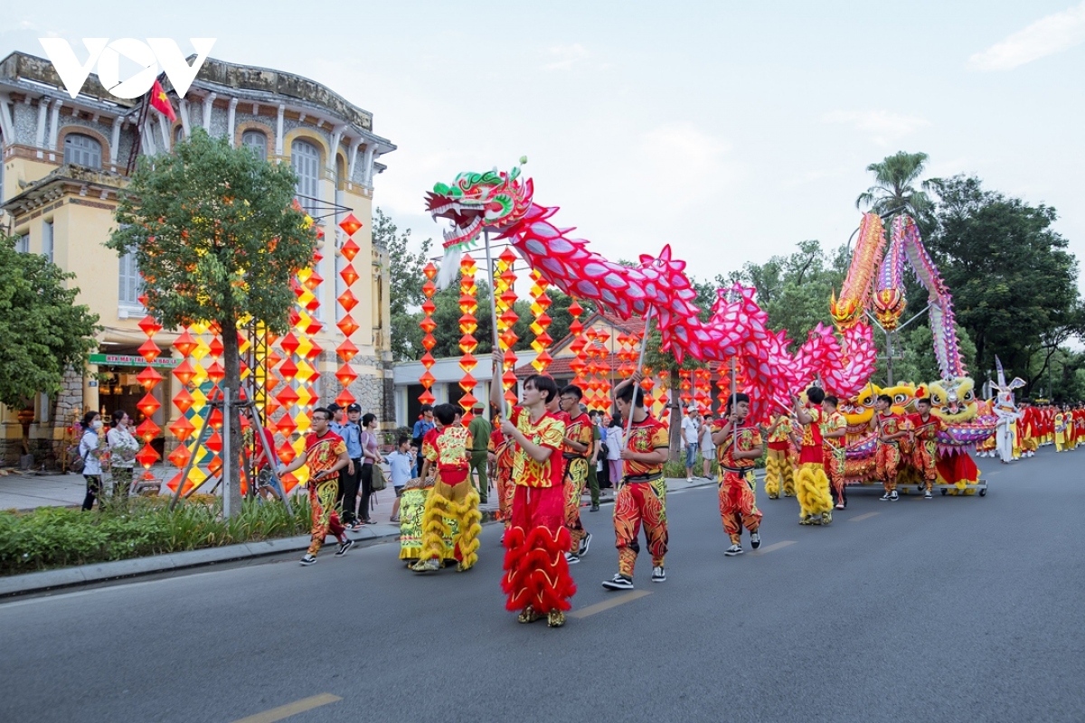 The parade greatly excites crowds who throng streets of the central city.