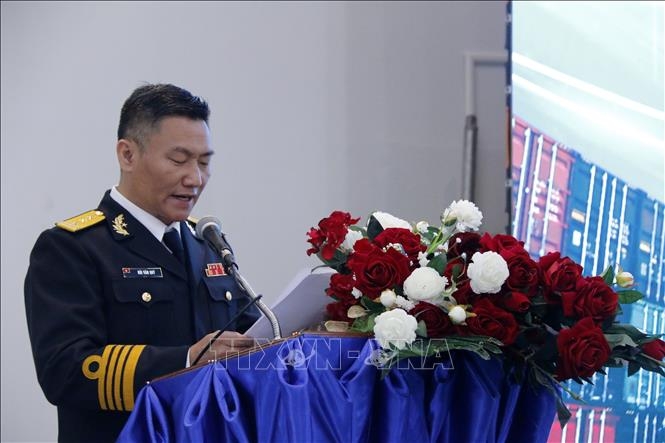 Senior Lieutenant Colonel Bui Van Quy, deputy general director of Saigon Newport Corporation (SNP), addresses the event (Photo: VNA)
