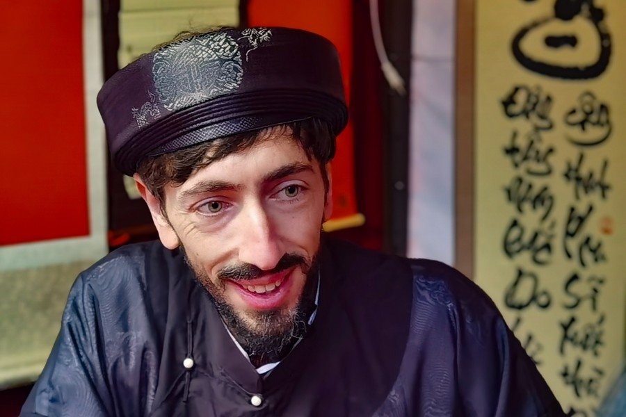 He recently won second prize at a Vietnamese national contest of writing calligraphy.