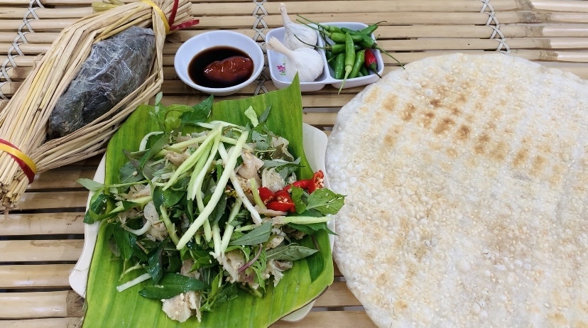 An eye-catching dish of tre (fermented pork)