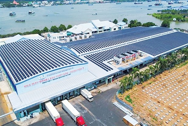 Solar panels installed on the rooftops of a seafood processing plant in the Mekong Delta