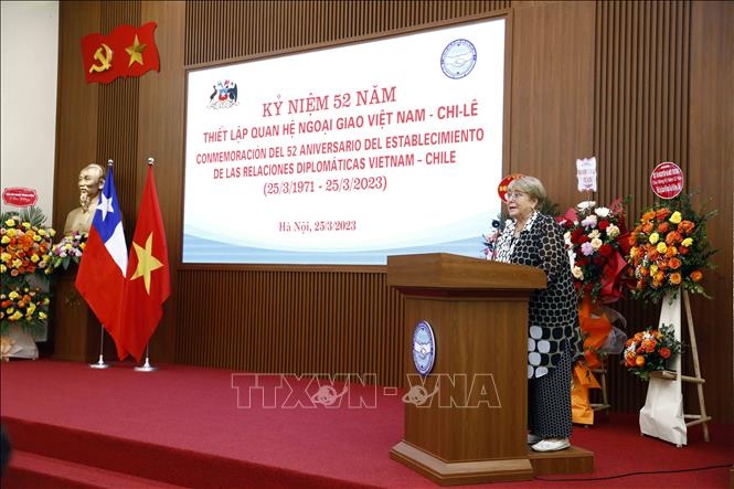 Former Chilean President Michelle Bachelet speaks at the event. (Photo: VNA)