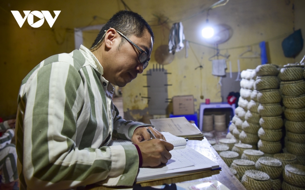 Chan Sok of Cambodia is assigned with the task of recording the daily activities of prisoners.