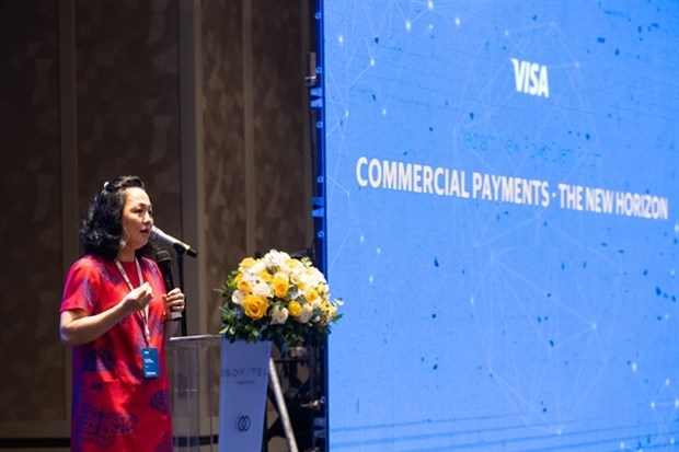 Dung Dang, Visa country manager for Vietnam and Laos, delivers a speech at the event entitled “New Flows Client Forum”.