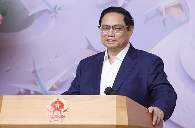 Prime Minister Pham Minh Chinh speaks at the meeting. (Photo: VNA)
