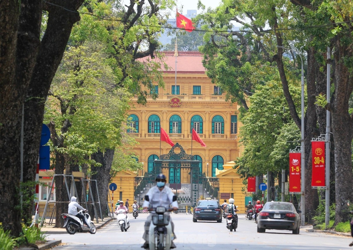 Impressive banners are hung out along Hoang Van Thu street leading towards the Presidential Palace.
