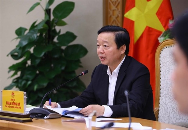 Deputy Prime Minister Tran Hong Ha speaks at the meeting on the progress of essential works in Long Thanh International Airport.