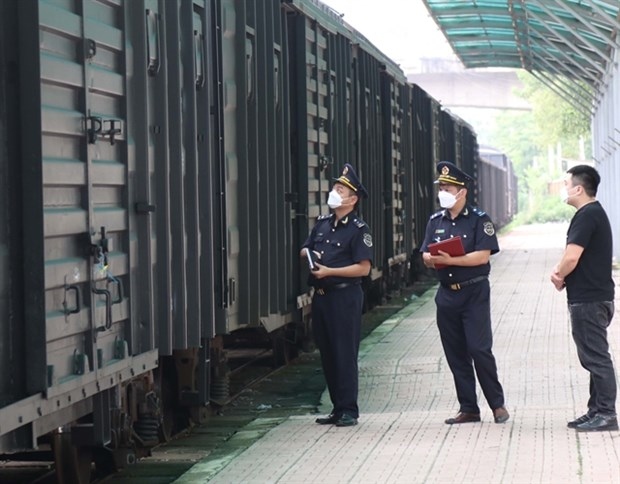 The Dong Dang Customs check goods before a train leaves Dong Dang Railway Station in the northern mountainous province of Lang Son