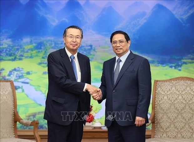 PM Pham Minh Chinh (R) and JETRO Chairman Ishiguro Norihiko. (Photo: VNA)