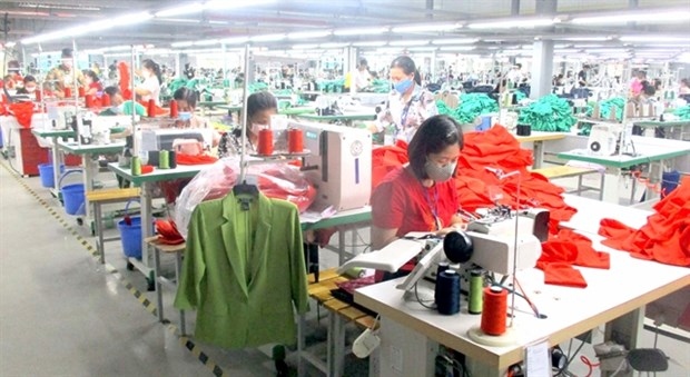 Production at Son Ha Garment Export Factory in Thanh Hoa province. Local businesses need huge capital to invest in green production processes.