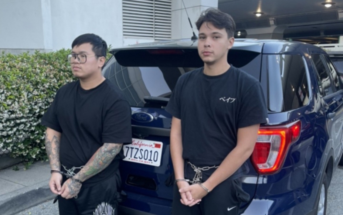 Phan Polie, 27, and Nguyen Vu Jaidan, 26, are arrested by Vietnamese police 