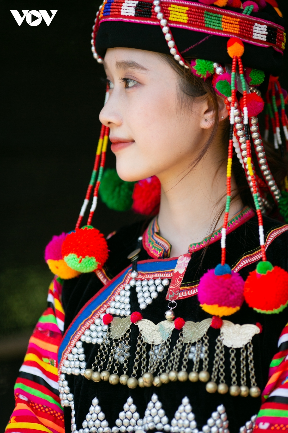 The clothes worn by Ha Nhi Hoa ethnic minority people are as colourful as flowers in the forest. They live close to nature and they reflect nature in their own clothes. Photographed is Nguyen Thi Phuong Uyen, Miss Hoa Ban 2023, who models the Ha Nhi Hoa ethnic costume.