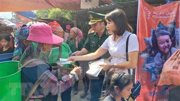 Women from ethnic groups in Muong Khuong district, northern province of Lao Cai are told about human trafficking prevention and control. (Photo: VNA)