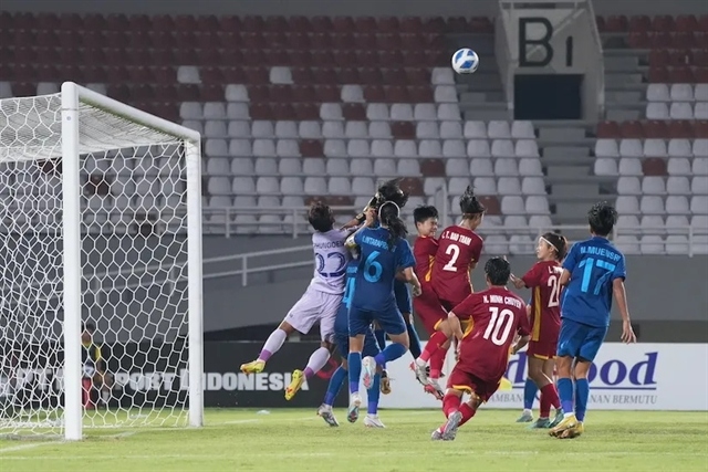 Vietnam players (in red) against Thailand during the final of the AFF Women's U19 Football Championship on July 15 in Indonesia. Thailand won 2-1. Photo courtesy of AFF
