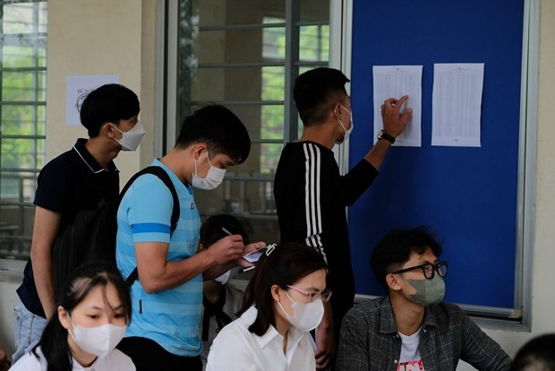 Vietnamese workers sit for a foreign language exam before going abroad (Photo: laodong.vn)