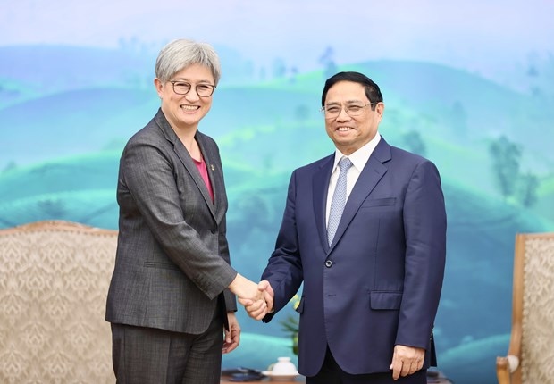 Prime Minister Pham Minh Chinh (R) and Australian Minister for Foreign Affairs Penny Wong at the meeting in Hanoi on August 22 (Photo: VNA)