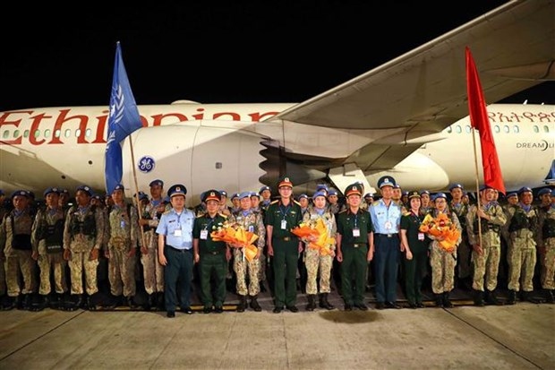 A homecoming ceremony is held at Noi Bai International Airport in Hanoi on August 15 morning for the unit.