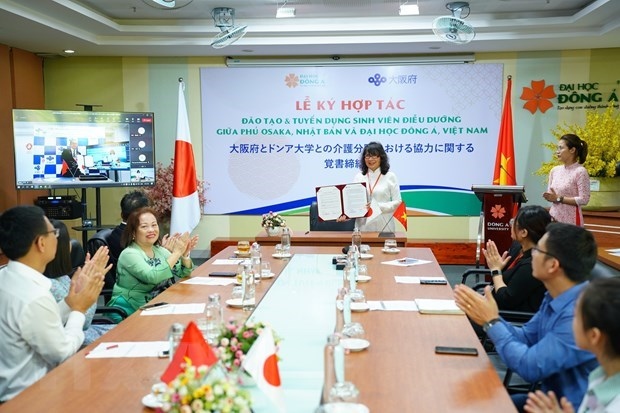 Participants at the signing ceremony.